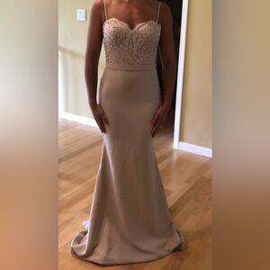 Evening prom gown. Worn only one time. No tags. Very cute and chic